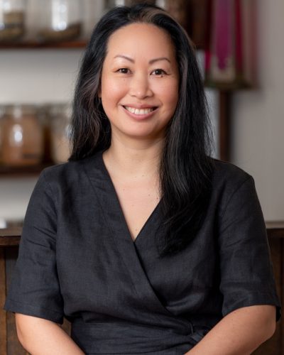 Headshot of Janell Shun, a Reiki practitioner, exuding warmth and serenity.